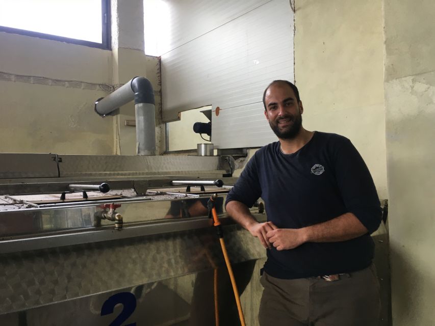 Chania Private Olive Oil Tour: Oil Tasting & Villages Tour - Modern olive oil factory tasting next to the machinery