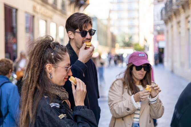 Malaga Food Tour with 12+ Tastings: Tapas, Olive Oil, Ham & More - Price and Logistics: Why $104.53 Usually Adds Up