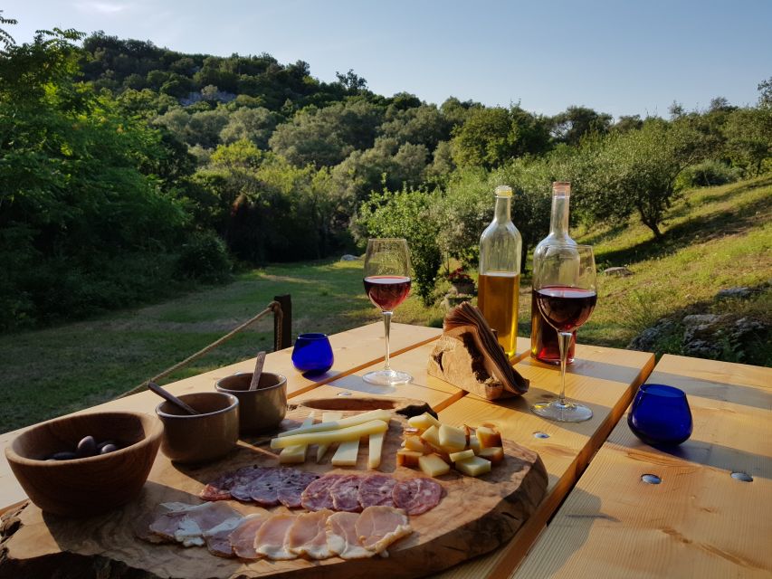 North Corfu: Olive Tour with Olive Oil Tasting and Mezze - The early 1900s olive press: where the story turns mechanical
